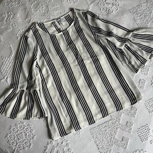 Elle women’s size large black‎ and white striped blouse with bell sleeves